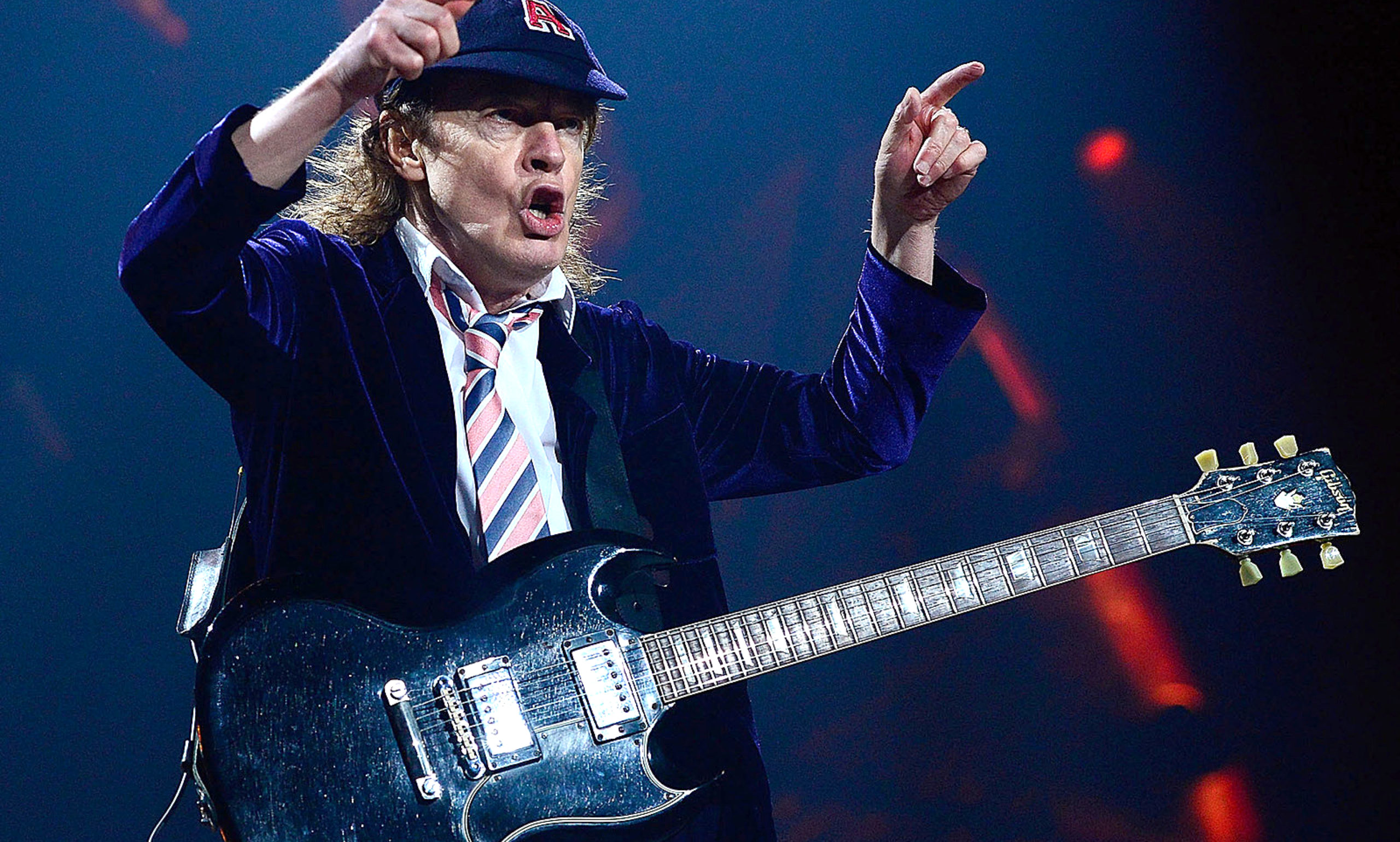 7 of the best Angus Young riffs you've never heard before - How Old Is Angus Young? AC/DC's Guitar Legend Then And Now