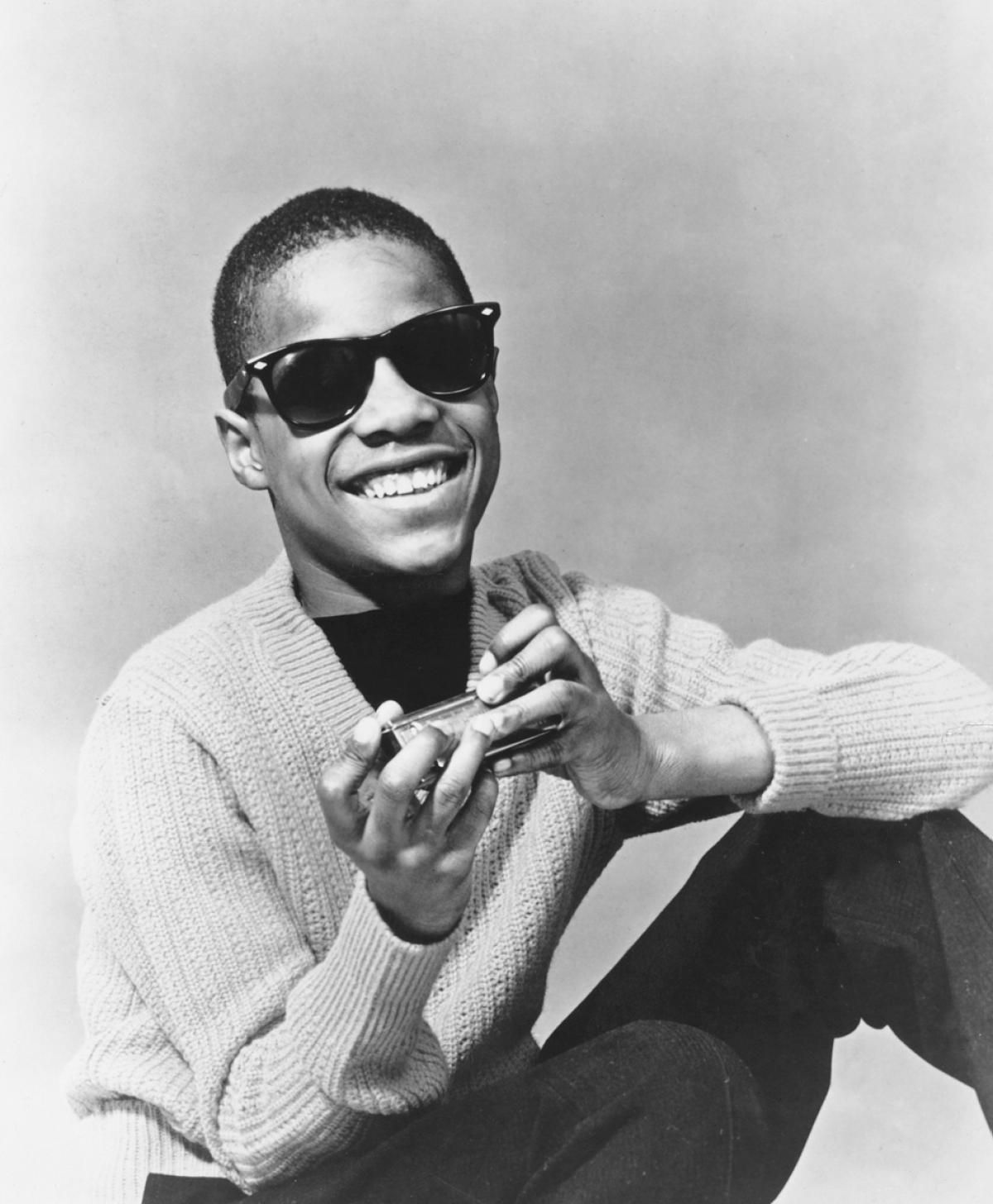 A young Stevie Wonder posed with his harmonica circa 1960. At 11-years - How Old Is Stevie Wonder? Musical Genius’s Age in 2025