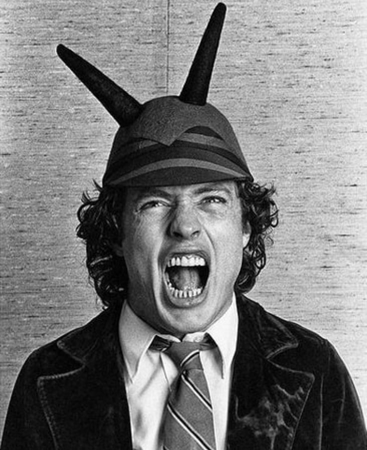 Angus Young | Acdc angus young, Angus young, Acdc angus - How Old Is Angus Young? AC/DC’s Guitar Legend Then And Now