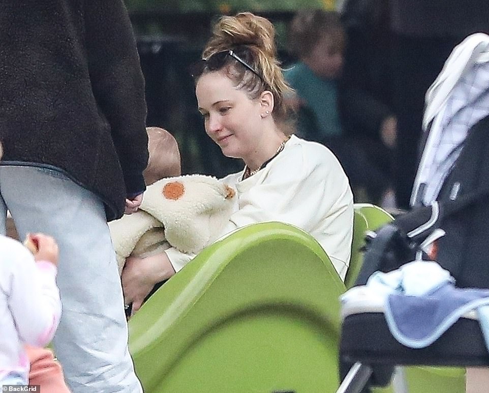 Baby's day out! Jennifer Lawrence is a doting mother as she makes the - Jennifer Lawrence Husband: The Man Behind The Oscar Winner’s Love Story