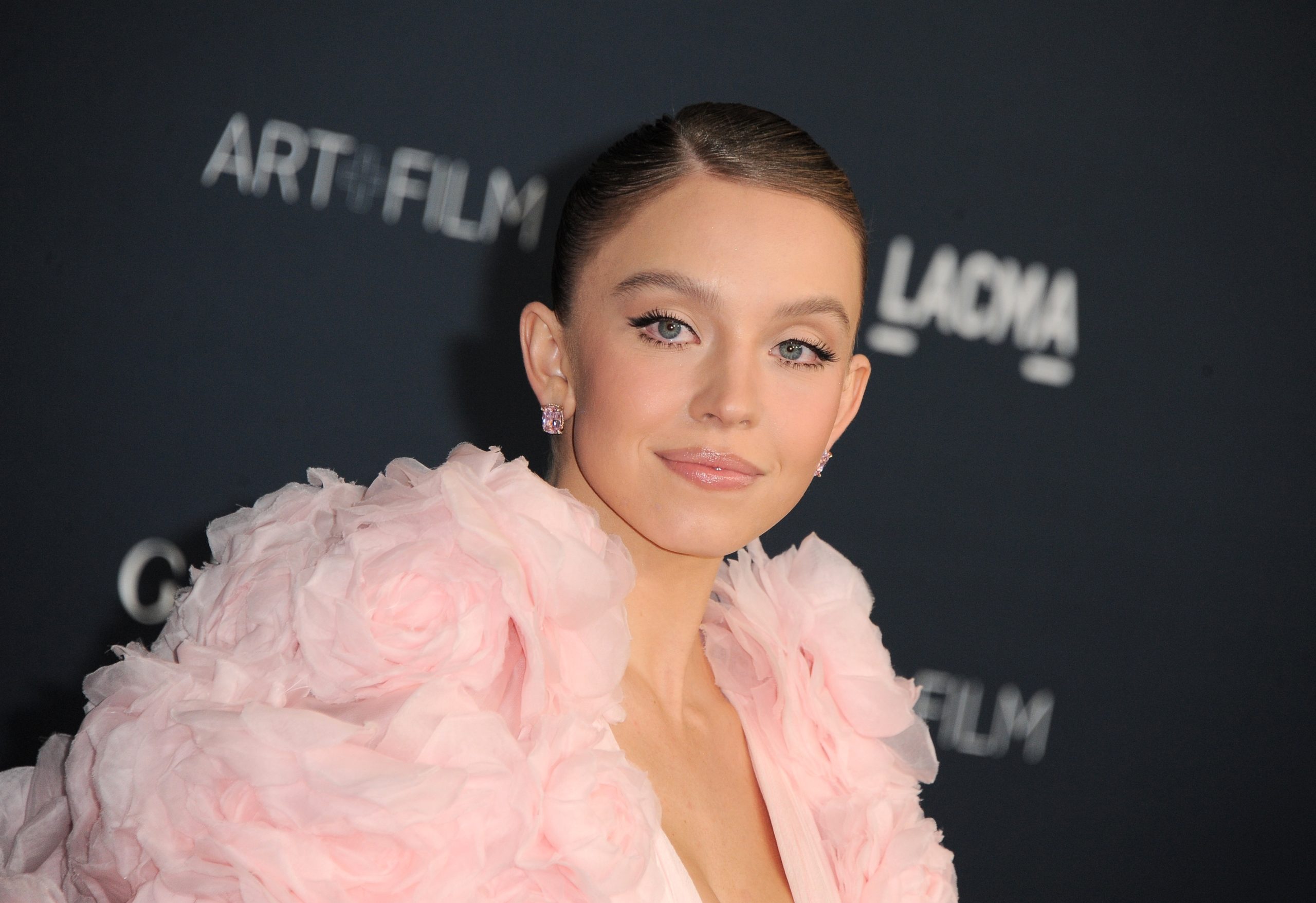 Celebrity Sydney Sweeney Poses in String Bikinis, Necklaces and Hoop - Sydney Sweeney Bra Size, Height & More – Full Stats