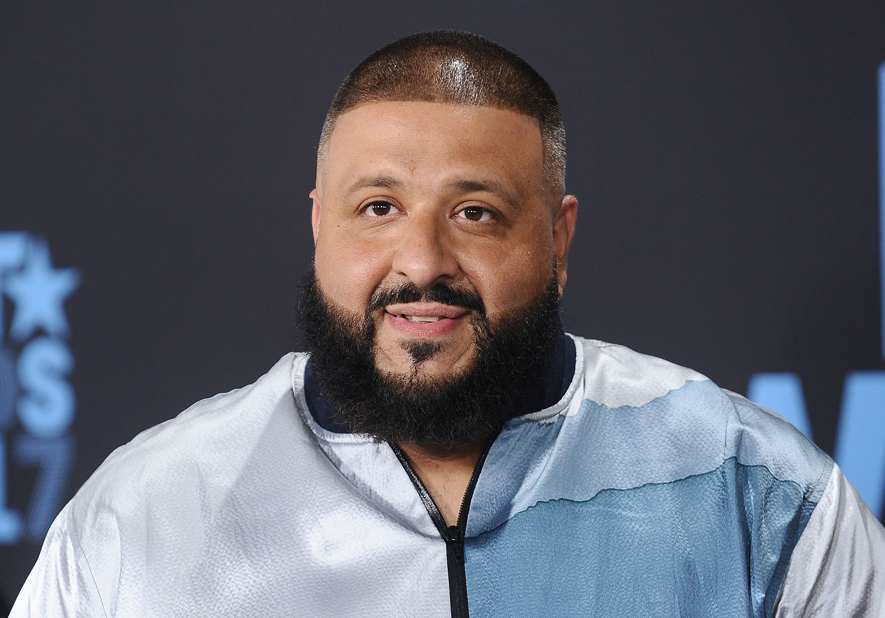 DJ Khaled's Barber Wears Protective Gear and a Face Mask While Giving - DJ Khaled Ethnicity: Where Is The Music Mogul Really From?
