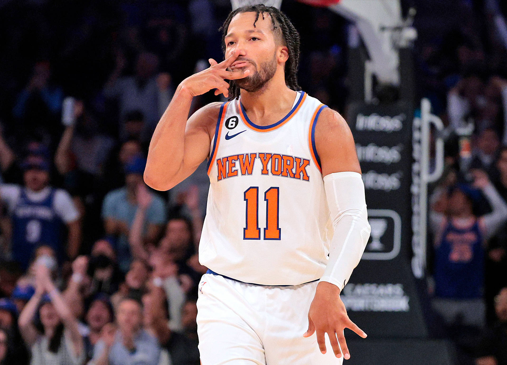 Download Jalen Brunson Gang Sign Up Wallpaper | Wallpapers.com - How Old Is Jalen Brunson? Knicks Star's Age & NBA Career So Far