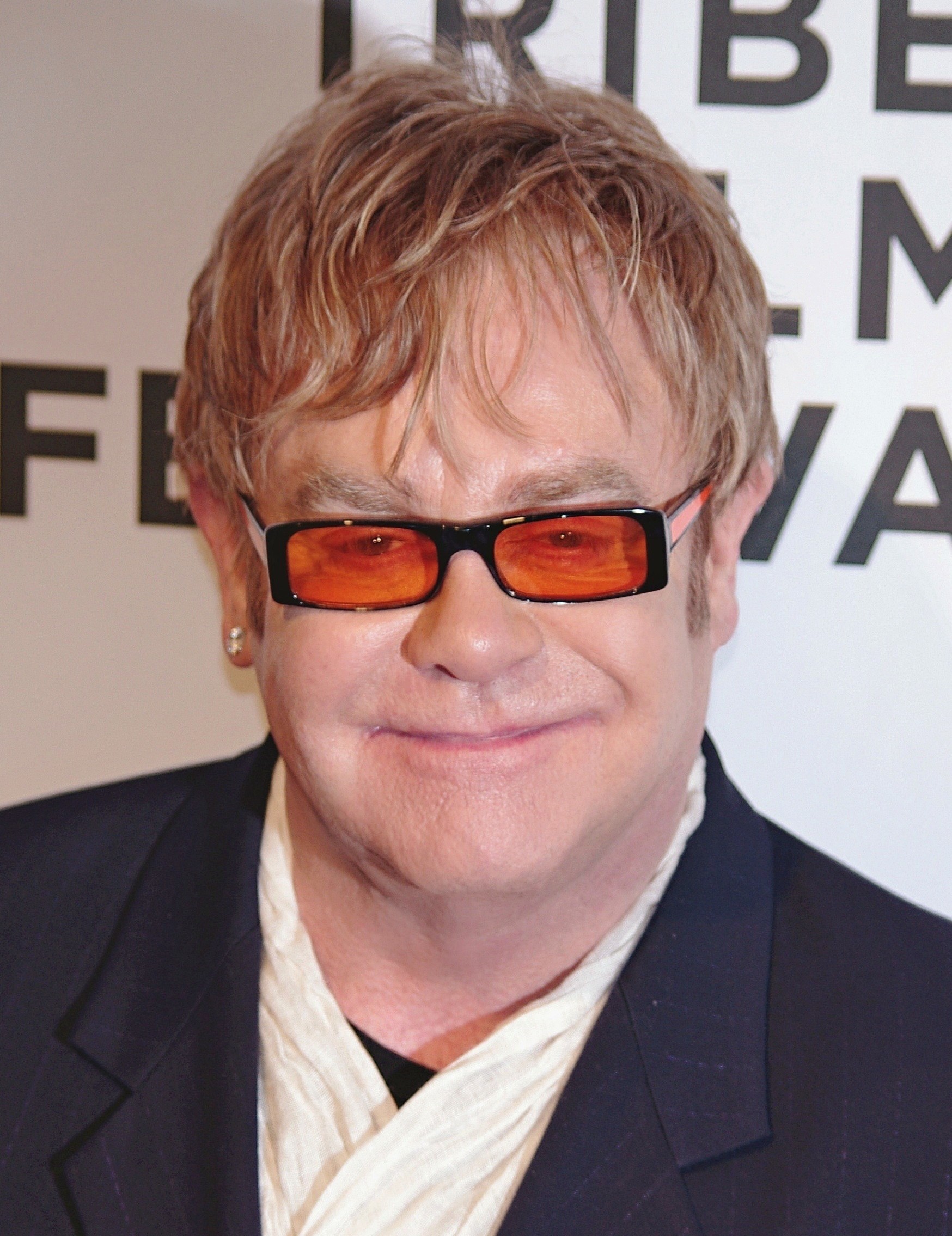 Elton John 2020: Husband, net worth, tattoos, smoking & body facts - Taddlr - How Old Is Elton John? A Legend Through The Years