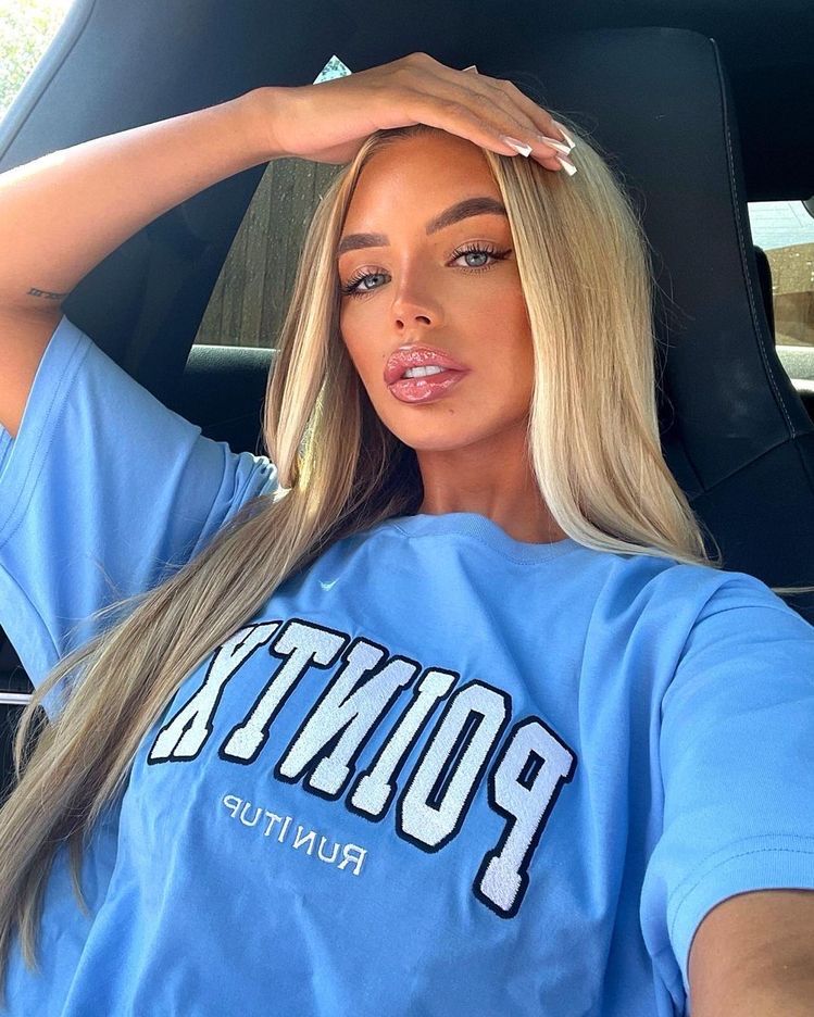 Keisha Sarah posing for Instagram selfie picture in the car in 2022 - Keisha Sarah: Sexy Pics of the Confident Content Queen
