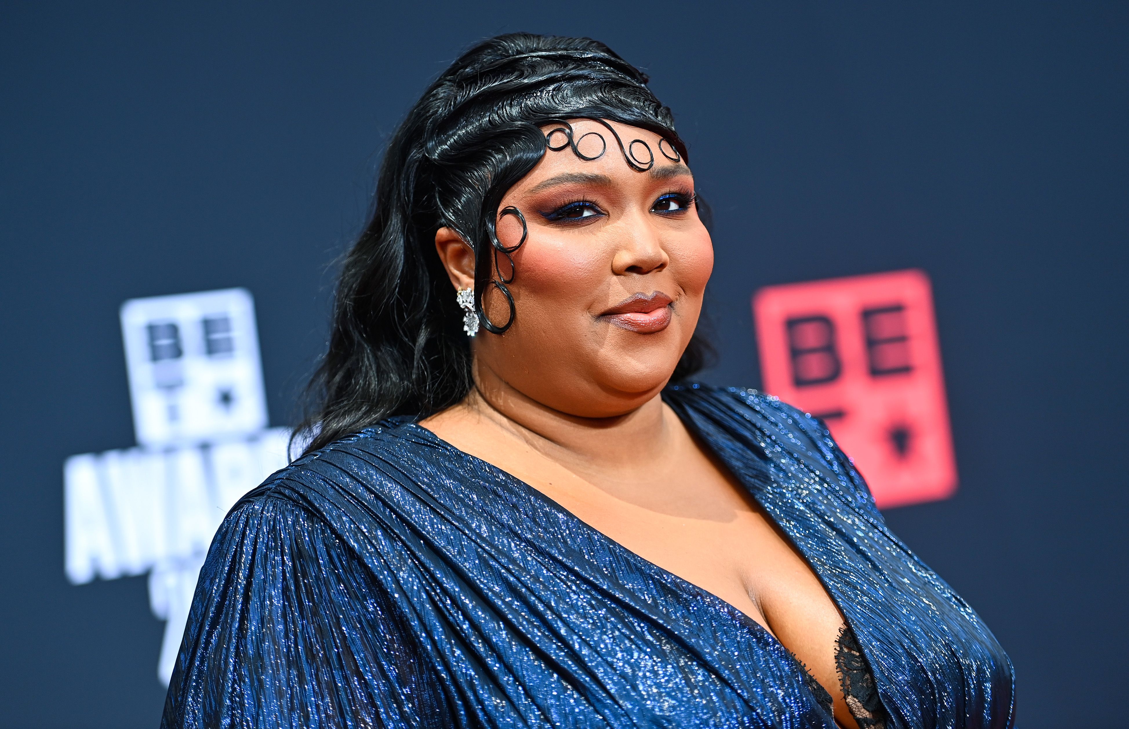 Lizzo Wears Barbiecore Bikini, Matching Sunglasses to Celebrate “About - Lizzo's Body Confidence: Full Measurements, Height & Real Talk