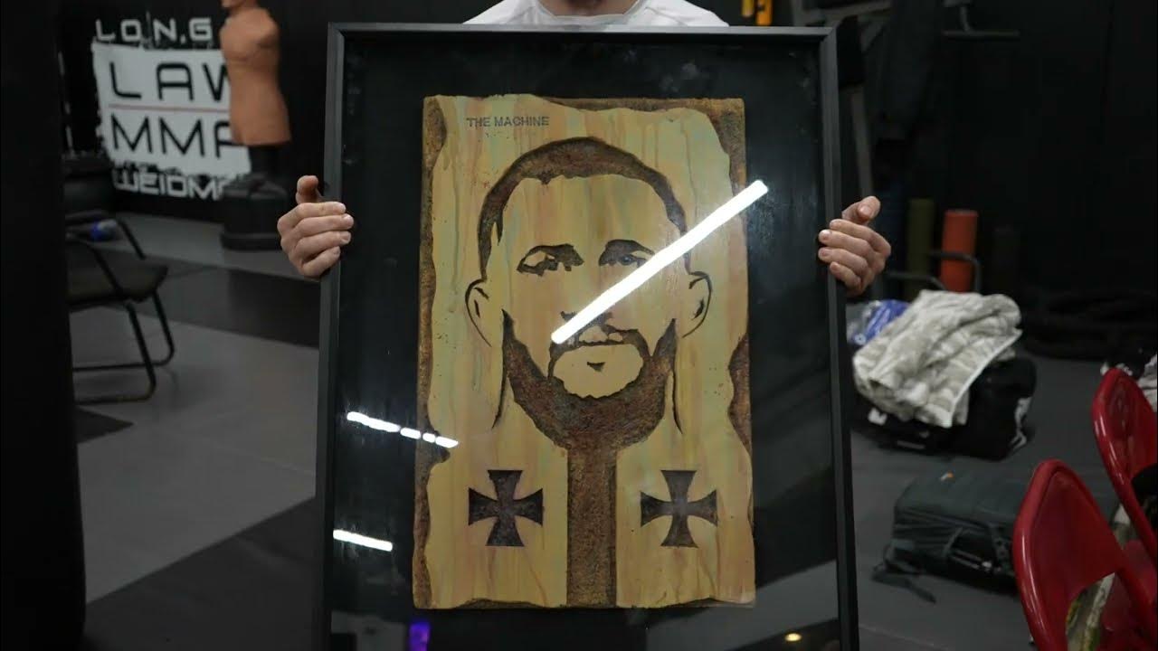 Merab Dvalishvili shows off his art that a Georgian fan made for him - How Old Is Merab Dvalishvili? – The Fighter’s Age and MMA Journey