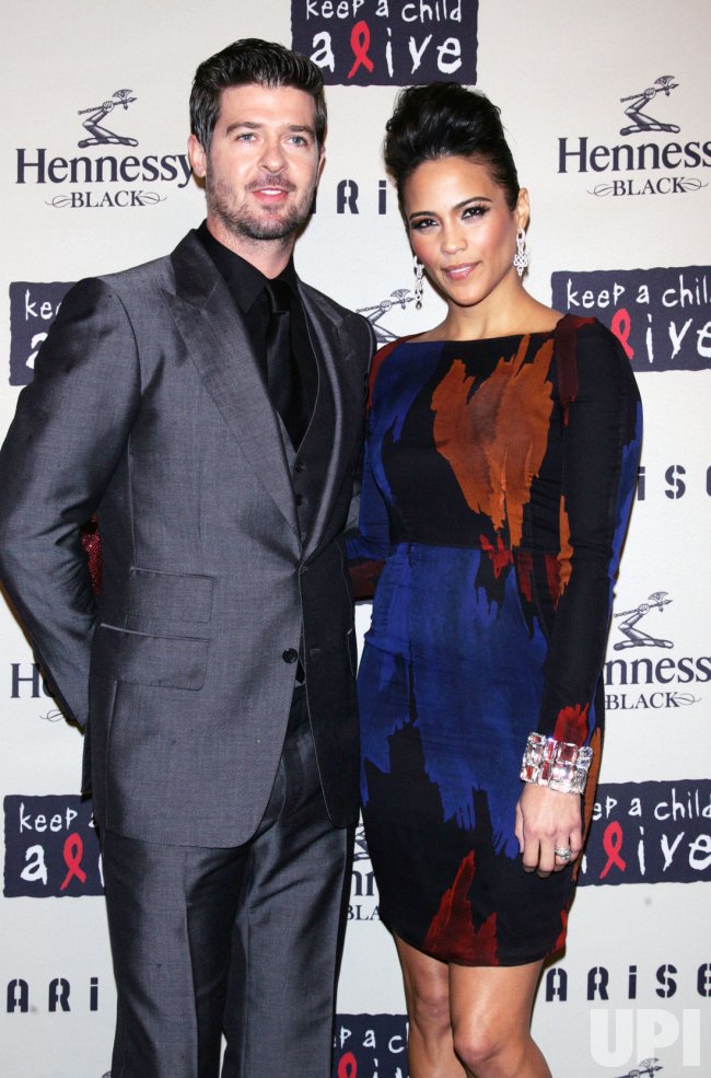 Photo: Paula Patton and husband Robin Thicke arrive at the Keep a Child - Paula Patton’s Husband: Robin Thicke, Their Highs and Lows